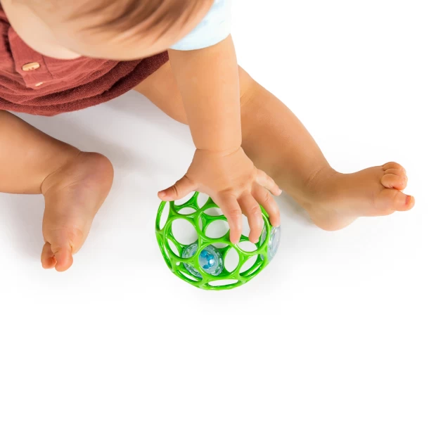 фото Развивающая игрушка: мяч oball с погремушкой (зеленый) bright starts